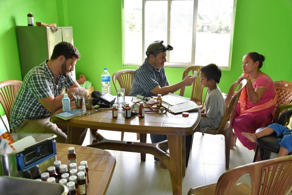 Tobias & Fredi Bacchetto doing follow-up examinations at Antyodaya school