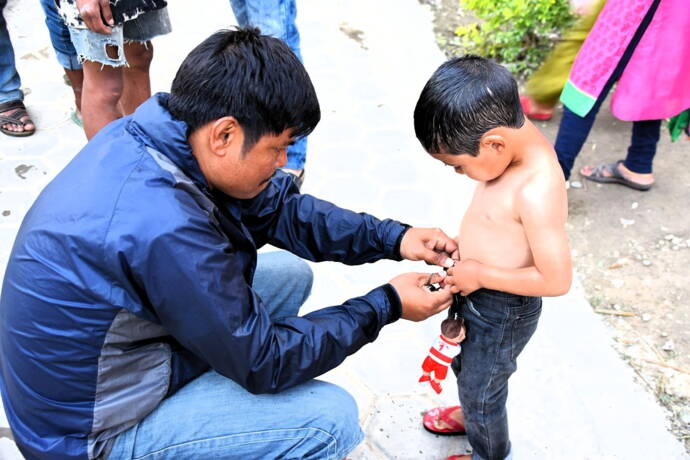 Rambabo and little pupil (Check for Scabies)