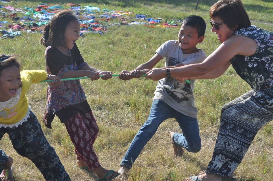 Christine Bacchetto playing with chepang children.jpg