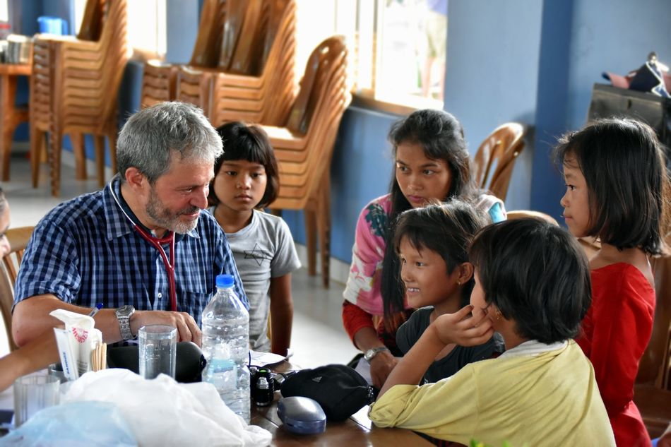 GP Dr. Fredi Bacchetto examining chepang children at Antyodaya school